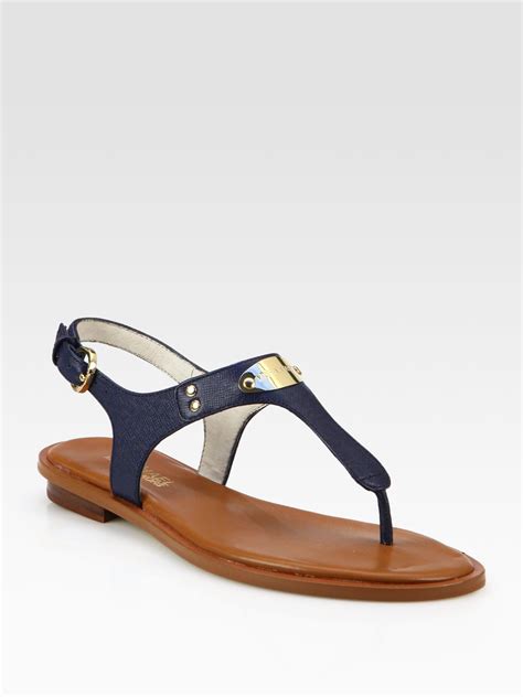 mk plate thong sandals